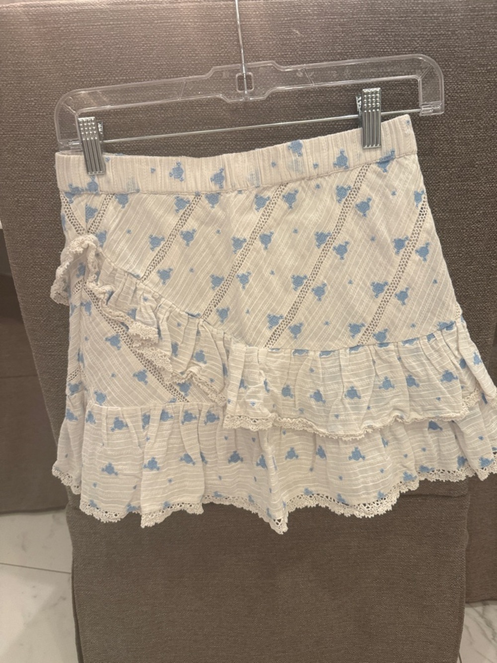 Love Shack Fancy White Ruffled Mini Skirt with Blue Floral Print